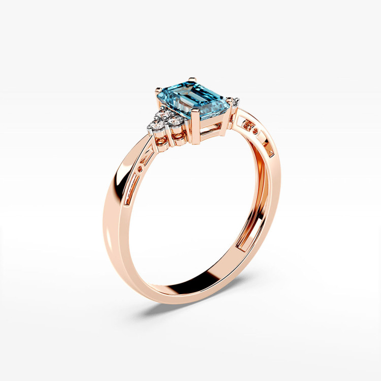 Złoty pierścionek z topazem i diamentami