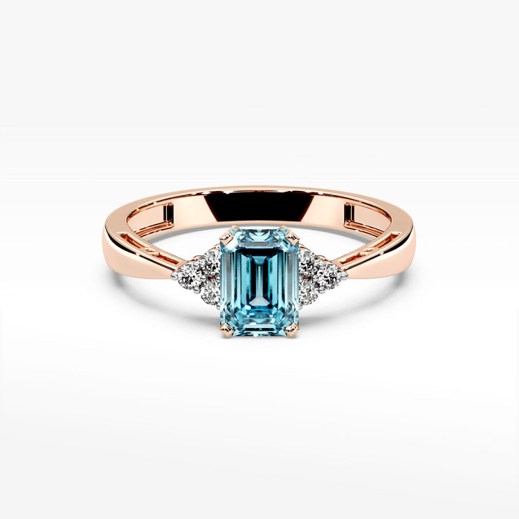 Złoty pierścionek z topazem i diamentami