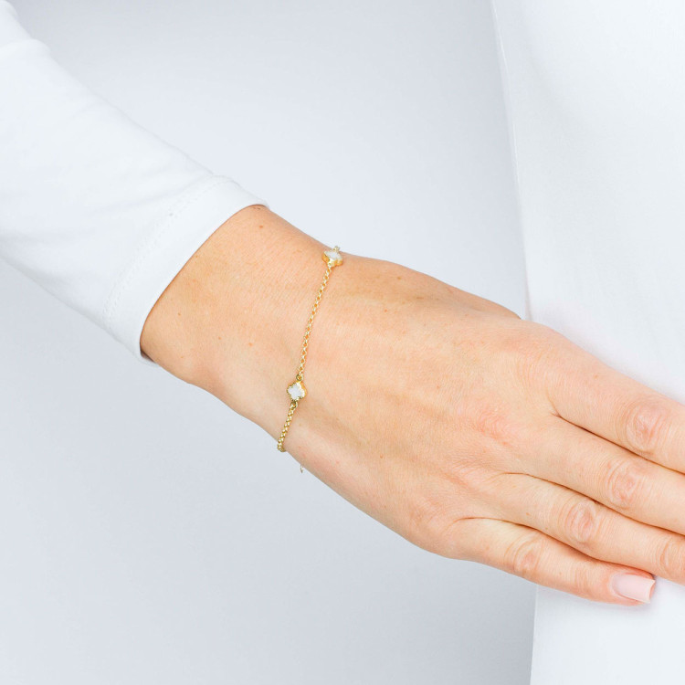 Bransoletka ze złota z białymi koniczynkami