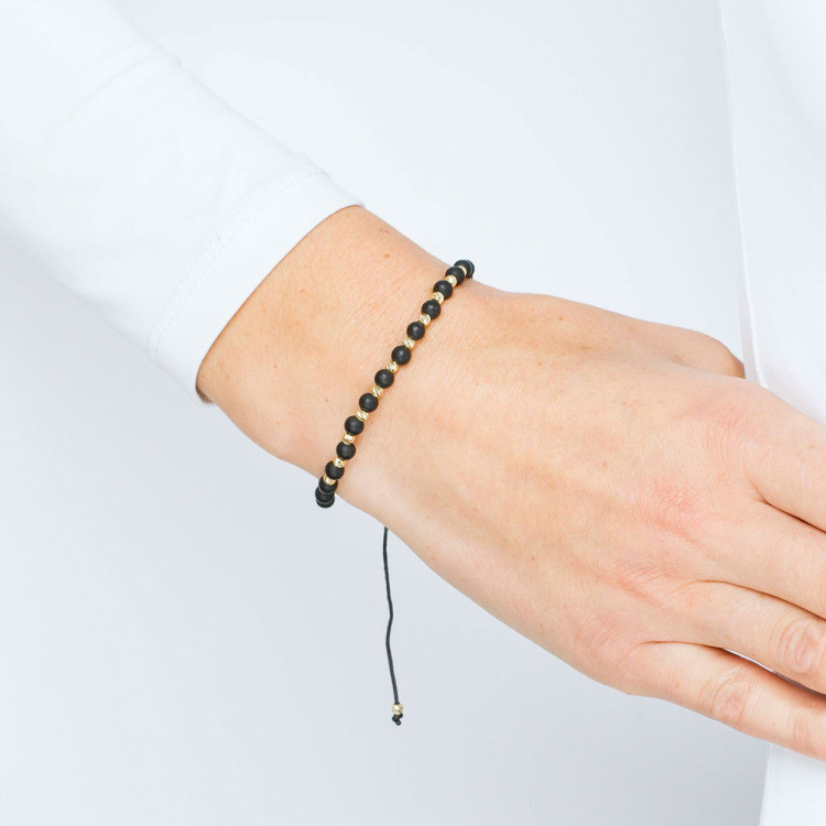 Bransoletka ze złota ze złotymi i czarnymi koralikami