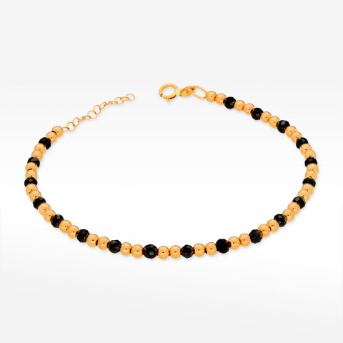 Bransoletka ze złota ze złotymi i czarnymi koralikami