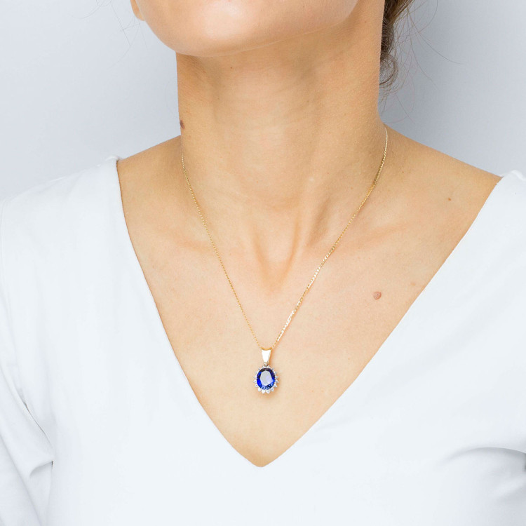 Zawieszka ze złota z niebieską i białymi cyrkoniami