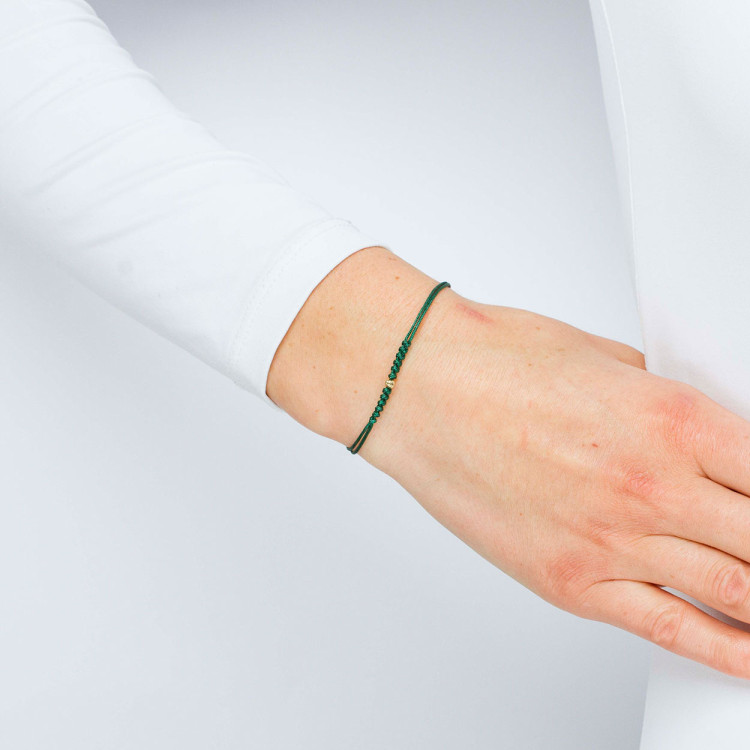 Bransoletka ze złota na sznurku