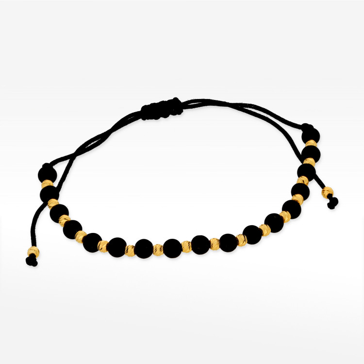 Bransoletka ze złota ze złotymi i czarnymi koralikami