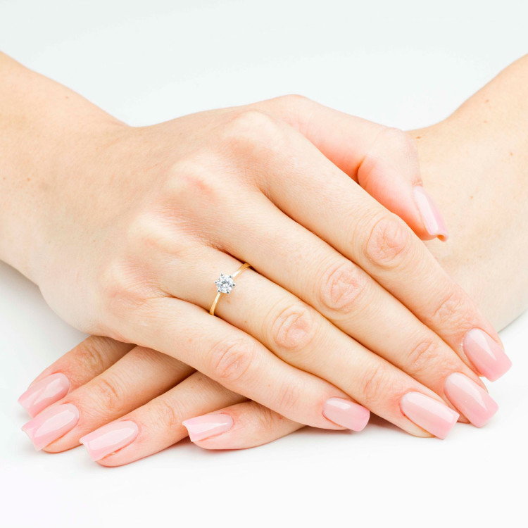 Pierścionek ze złota z białą cyrkonią