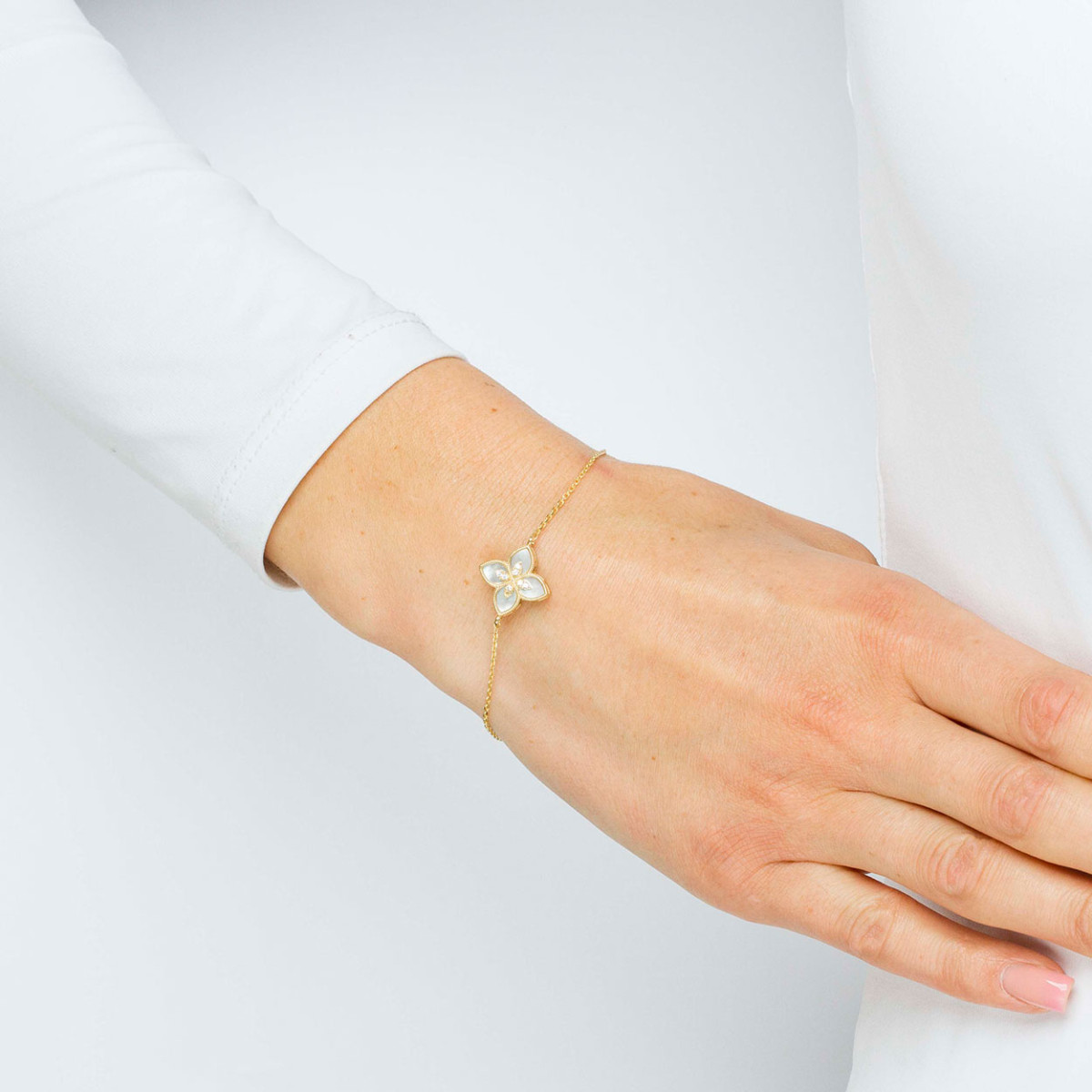 Bransoletka ze złota z masą perłową i białymi cyrkoniami