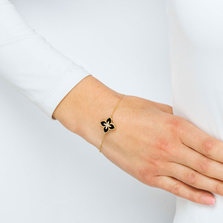 Bransoletka ze złota z onyksem i białymi cyrkoniami