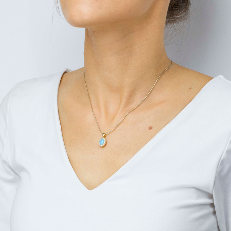 Zawieszka ze złota z opalem i białymi cyrkoniami