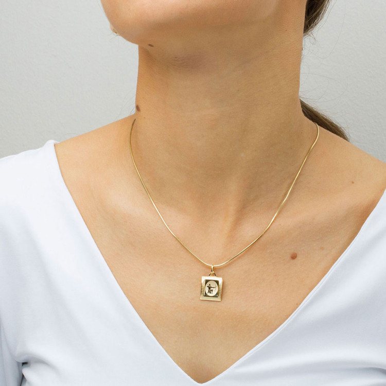 Zawieszka ze złota strzelec z wzorem greckim