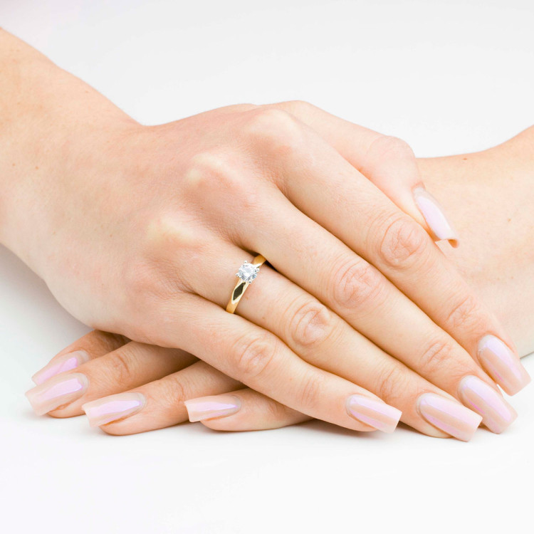 Pierścionek ze złota z białą cyrkonią