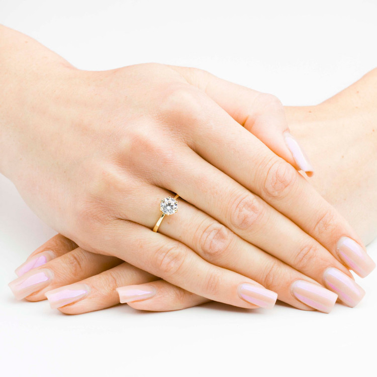 Pierścionek ze złota z białą cyrkonią