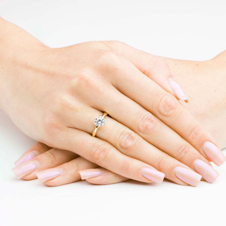 Pierścionek ze złota z białą cyrkonią