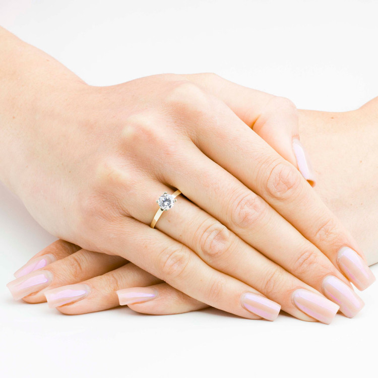 Pierścionek ze złota z białą cyrkonią