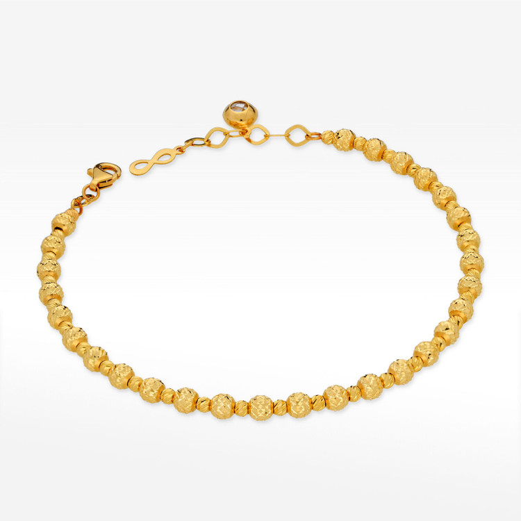 Bransoletka ze złota ze złotymi koralikami