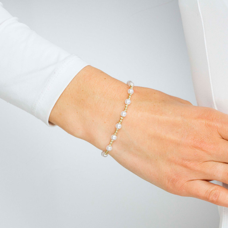 Bransoletka ze złota z białymi i złotymi koralikami