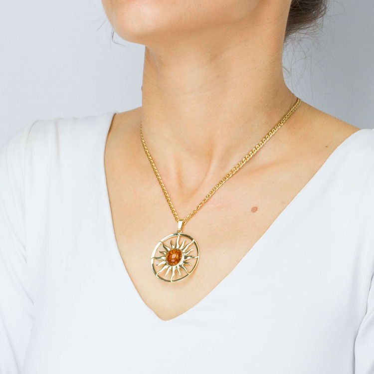 Zawieszka ze złota słońce z bursztynem