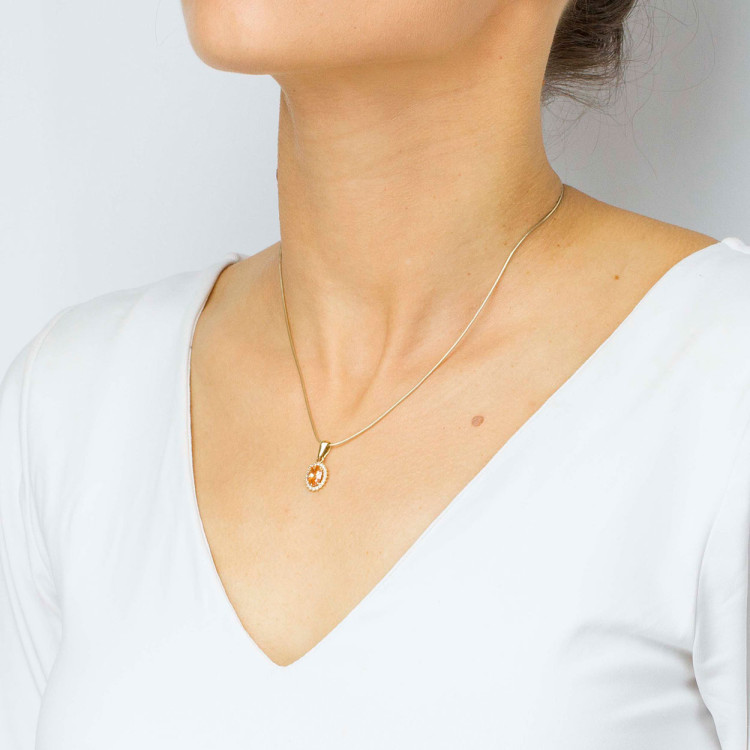 Zawieszka ze złota z żółtą i białymi cyrkoniami