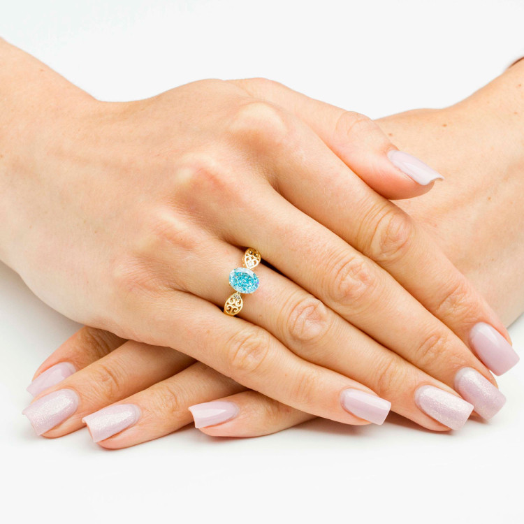 Pierścionek ze złota z niebieską cyrkonią