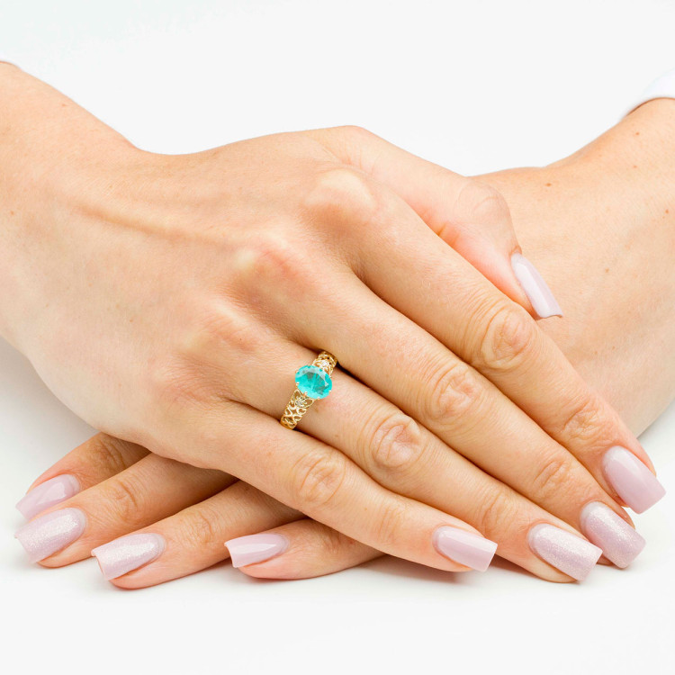 Pierścionek ze złota z zielonym kamieniem