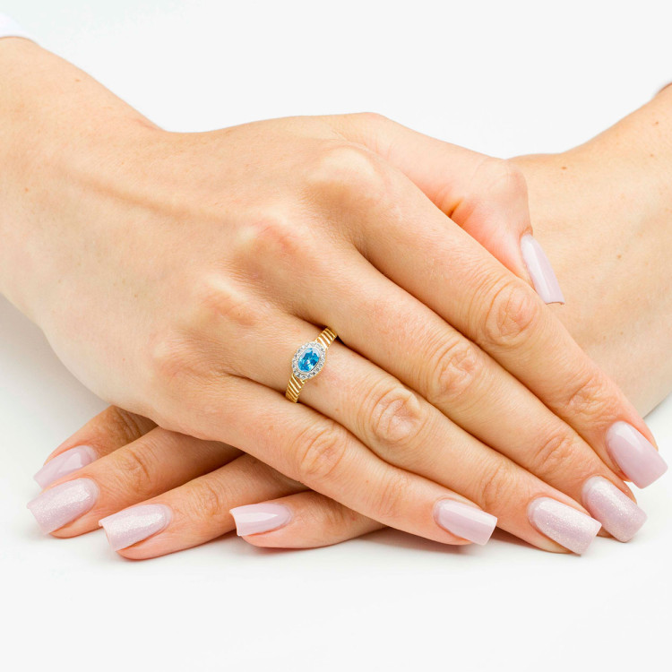 Pierścionek ze złota z niebieską i białymi cyrkoniami