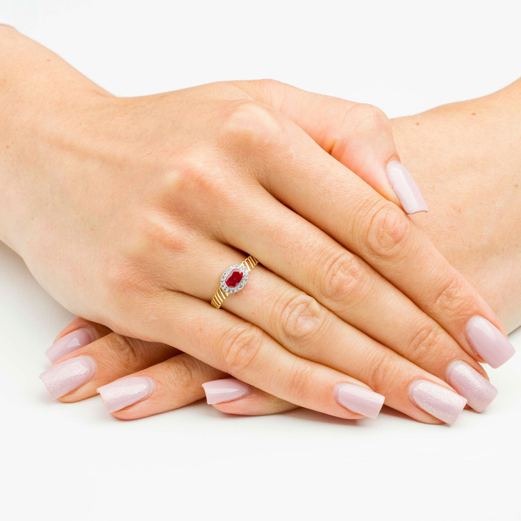 Pierścionek ze złota z różową i białymi cyrkoniami