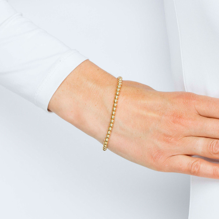 Bransoletka ze złota ze złotymi koralikami