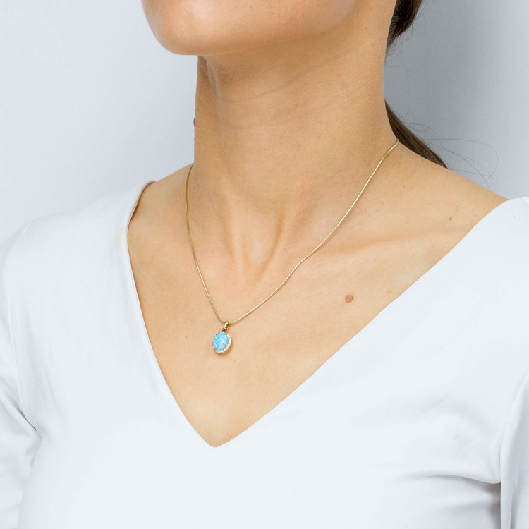 Zawieszka ze złota z opalem i białymi cyrkoniami