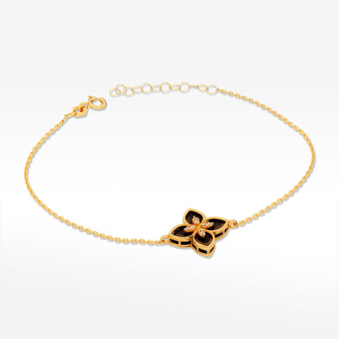 Bransoletka ze złota z onyksem i białymi cyrkoniami