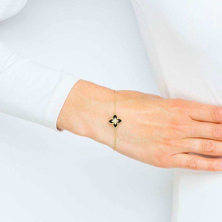 Bransoletka ze złota z onyksem i białymi cyrkoniami