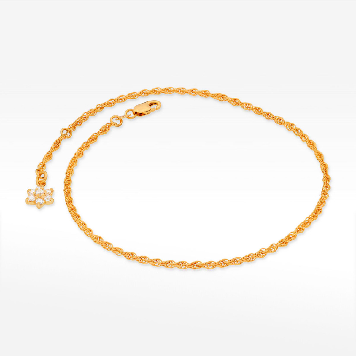 Bransoletka ze złota na nogę z kwiatkiem z białymi cyrkoniami