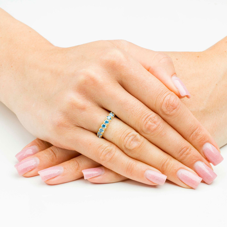 Pierścionek ze złota z niebieskimi cyrkoniami